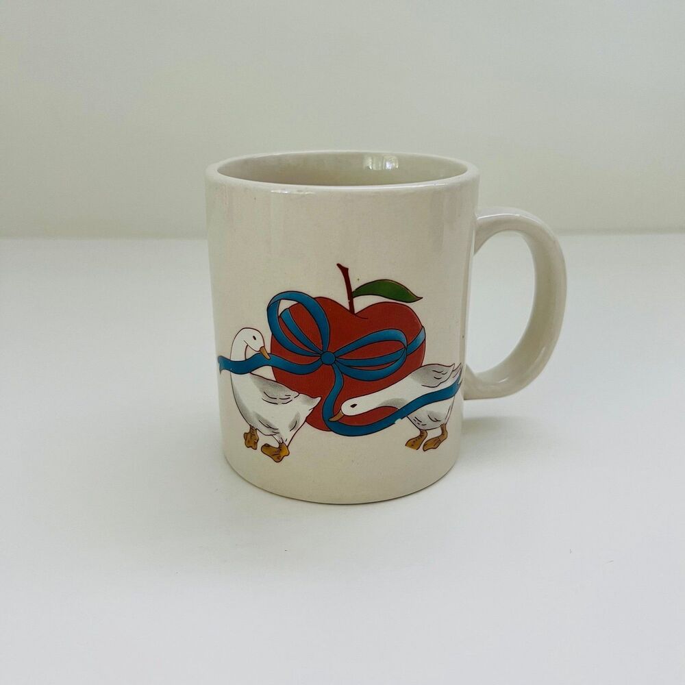 GIBSON DESIGN Apple Jack Geese Holding Blue Ribbon Coffee Mug Cup